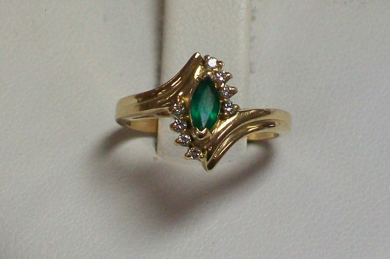 14K Yellow gold emerald and diamond gemstone ring  